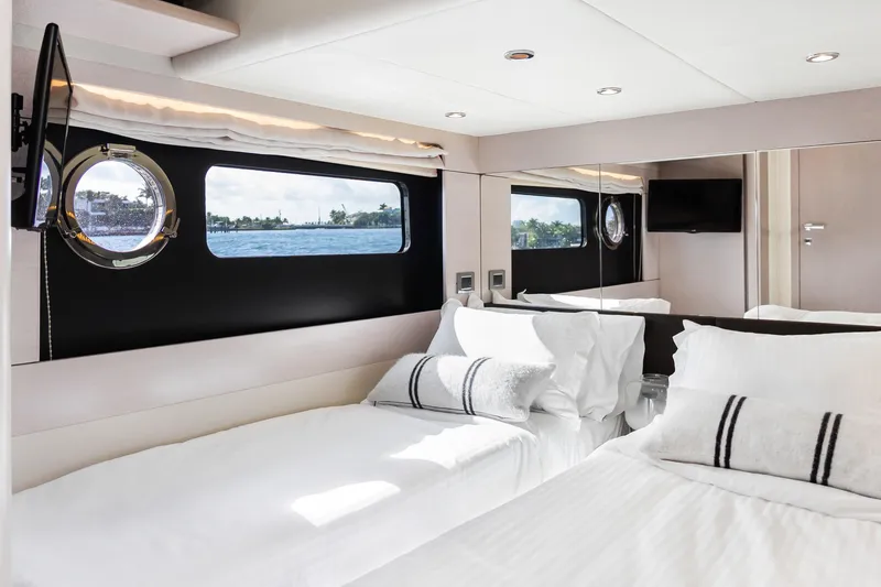 Slide: The Image of Luxurious cabin interior of 2019 Absolute 58 FLY yacht with elegant bedding and scenic window view. - 30