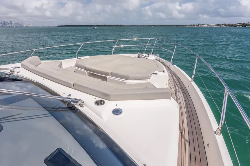 Slide: The Image of Luxurious 2019 Absolute 58 FLY yacht deck with sunbathing area on open sea. - 42