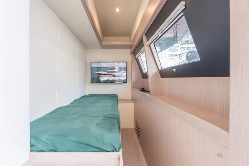 Slide: The Image of Interior cabin of 2019 Absolute 58 FLY yacht with bed and windows. - 52