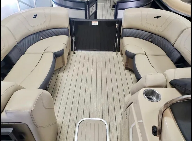 Slide: The Image of Interior of 2022 Starcraft SLS3 Tritoon with beige seating. - 3