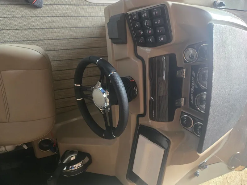 Slide: The Image of Interior view of 2022 Starcraft SLS3 Tritoon cockpit. - 5