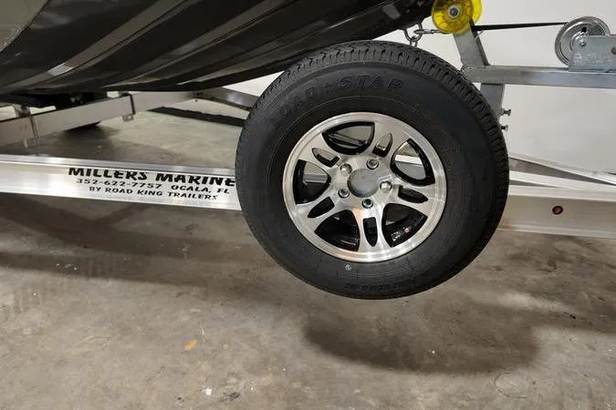Slide: The Image of Trailer wheel of 2025 SeaArk Shadow 18T boat by Millers Marine. - 4