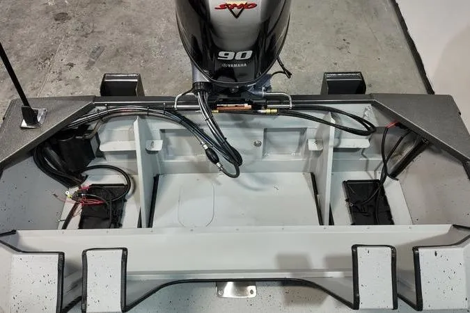 Slide: The Image of 2025 SeaArk Shadow 18T boat with Yamaha 90 engine, interior view. - 7