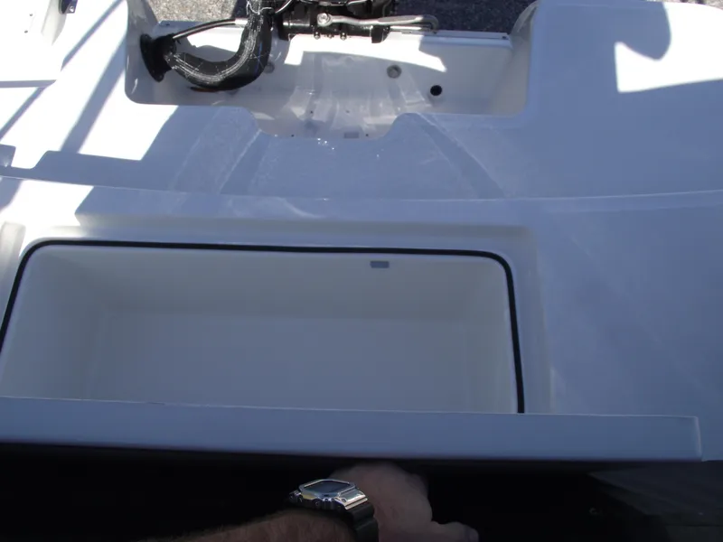 Slide: The Image of 2024 Bayliner Element M19 boat storage compartment and anchor. - 12