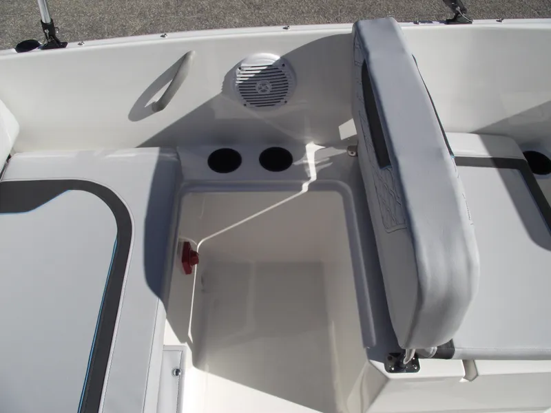 Slide: The Image of 2024 Bayliner Element M19 boat interior seating and storage compartment. - 13