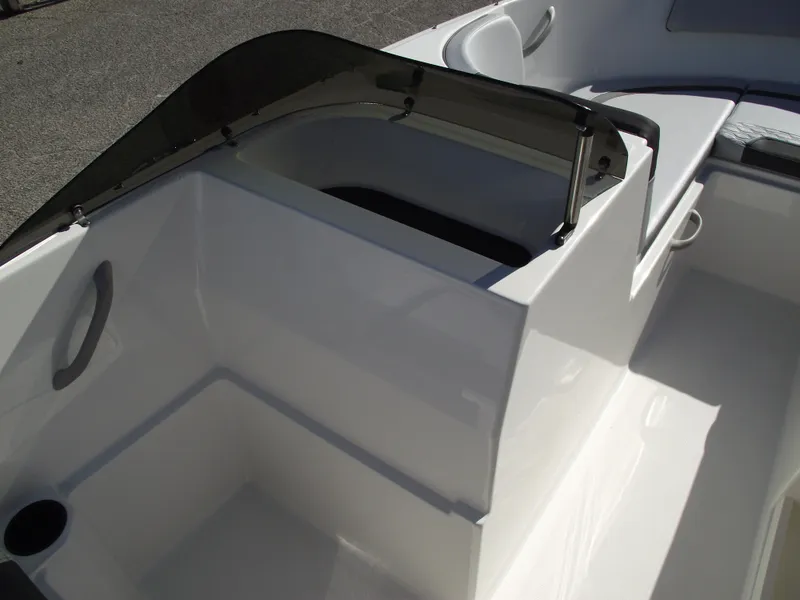 Slide: The Image of 2024 Bayliner Element M19 boat interior with seating and windshield. - 20
