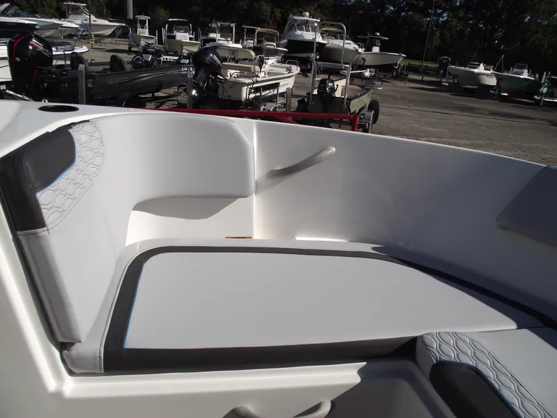 Slide: The Image of 2024 Bayliner Element M19 boat interior seating area. - 23
