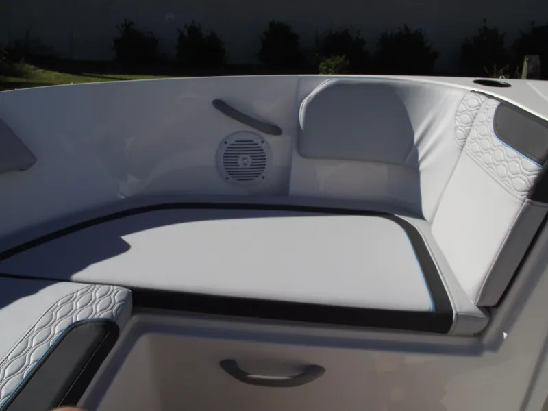 Slide: The Image of 2024 Bayliner Element M19 boat interior seating with speaker. - 25