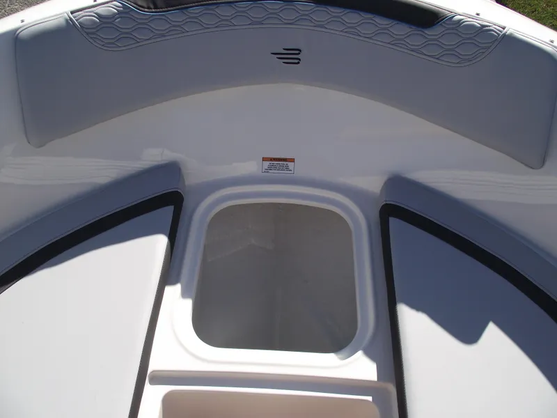 Slide: The Image of 2024 Bayliner Element M19 boat bow seating area with storage compartment. - 28