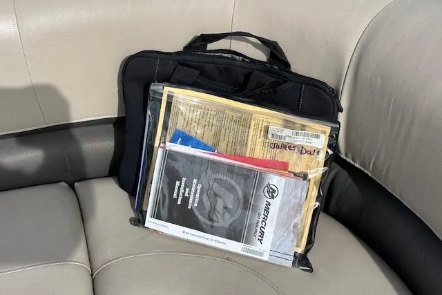 Slide: The Image of Bag with documents on Sun Tracker Bass Buggy 16 DLX 2020 boat seat. - 15