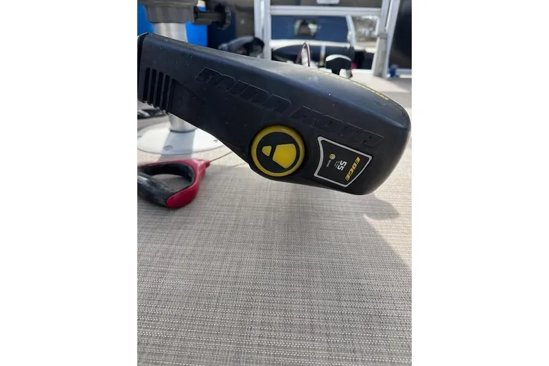 Slide: The Image of Close-up of a Sun Tracker Bass Buggy 16 DLX 2020 boat control panel. - 17