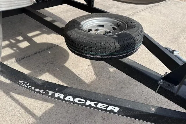 Slide: The Image of Trailer of 2020 Sun Tracker Bass Buggy 16 DLX with spare tire attached. - 18
