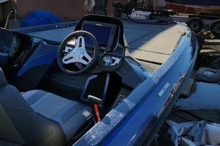 Slide: The Image of 2018 Skeeter FX21 Limited Edition boat interior with steering wheel and dashboard. - 20