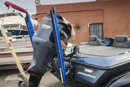 Slide: The Image of 2018 Skeeter FX21 Limited Edition boat with Yamaha 250 engine, parked outdoors. - 3