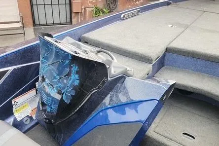 Slide: The Image of 2018 Skeeter FX21 Limited Edition boat interior with blue accents and seating. - 7