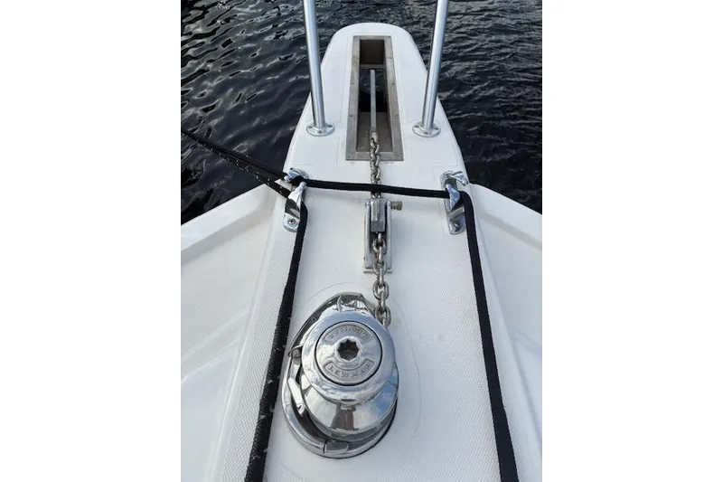 Slide: The Image of Bow of 2007 Bertram 360 yacht with anchor chain and winch. - 15