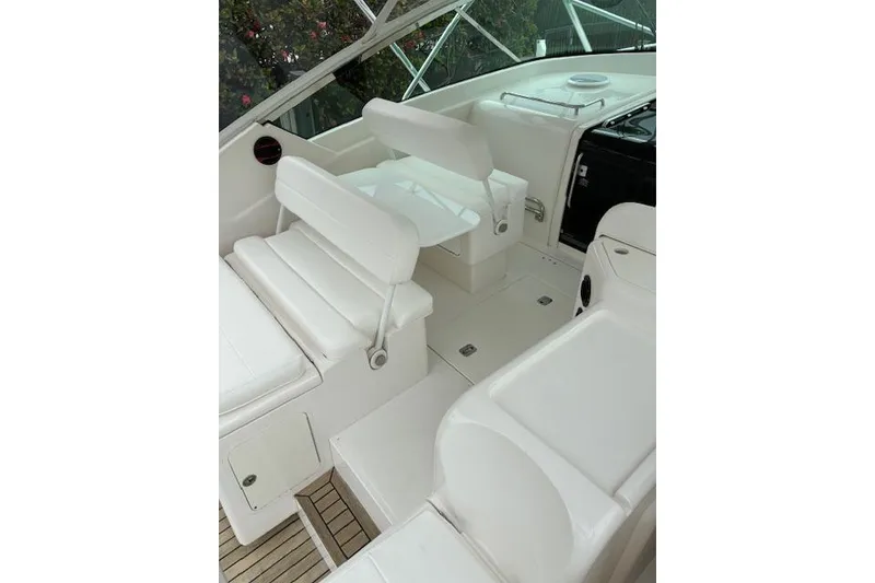 Slide: The Image of 2007 Bertram 360 boat interior with white seating and sleek design. - 18
