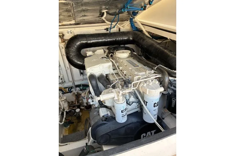 Slide: The Image of Engine compartment of a 2007 Bertram 360 boat with CAT components. - 24