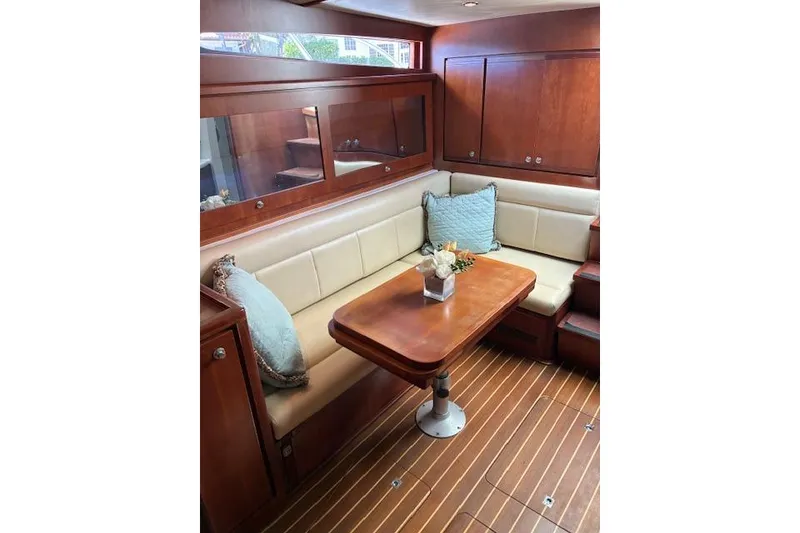 Slide: The Image of Luxurious interior of 2007 Bertram 360 yacht with elegant wood and leather seating. - 31