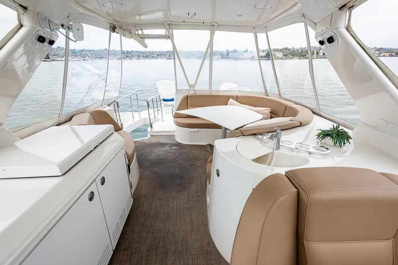 Slide: The Image of Luxurious interior of 2005 Carver 560 Voyager yacht with seating and scenic view. - 20