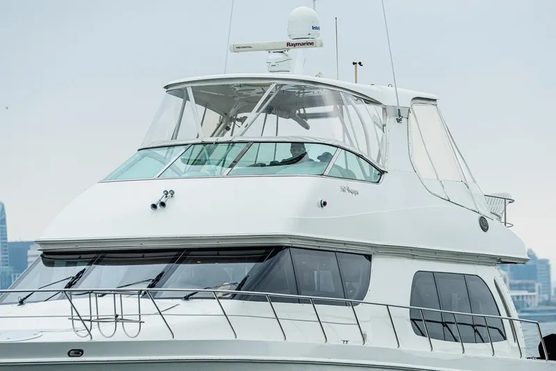 Slide: The Image of 2005 Carver 560 Voyager yacht with sleek design and modern features. - 6