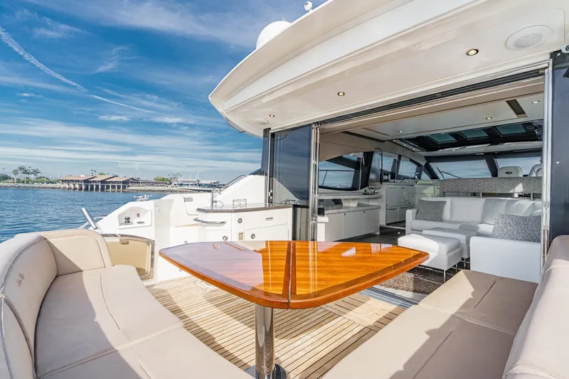 Slide: The Image of Luxurious 2016 Sea Ray L590 yacht with spacious deck and elegant interior. - 19