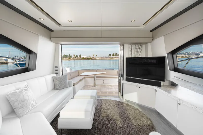 Slide: The Image of Luxurious interior of 2016 Sea Ray L590 yacht with modern furnishings and waterfront view. - 27