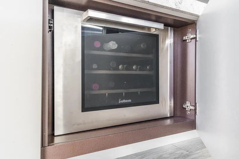 Slide: The Image of Built-in wine cooler on 2016 Sea Ray L590 yacht, stainless steel finish. - 30