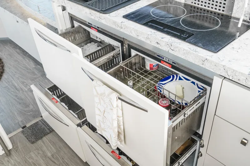 Slide: The Image of Modern kitchen drawers in 2016 Sea Ray L590 yacht with ice maker and storage. - 36
