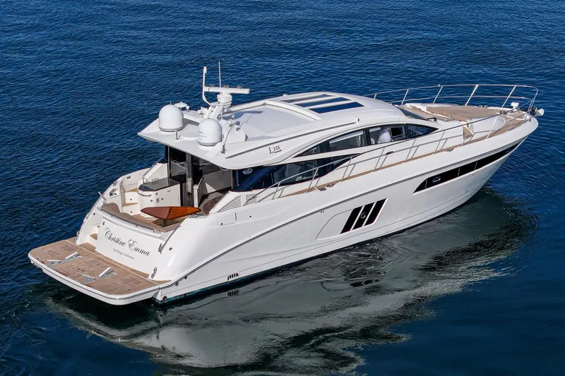 Slide: The Image of 2016 Sea Ray L590 luxury yacht cruising on calm blue waters. - 5