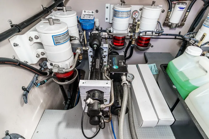 Slide: The Image of Engine room of 2016 Sea Ray L590 yacht with fuel filtration system and equipment. - 60