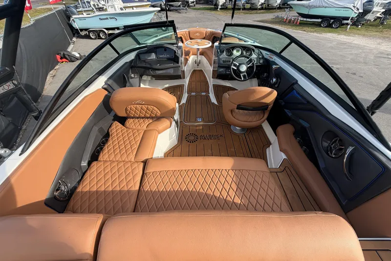 Slide: The Image of Interior of 2016 Monterey 218 Surf boat with luxurious seating and sound system. - 13
