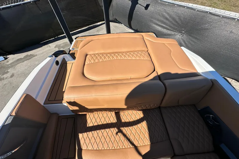 Slide: The Image of 2016 Monterey 218 Surf boat with tan leather seating and quilted design. - 28