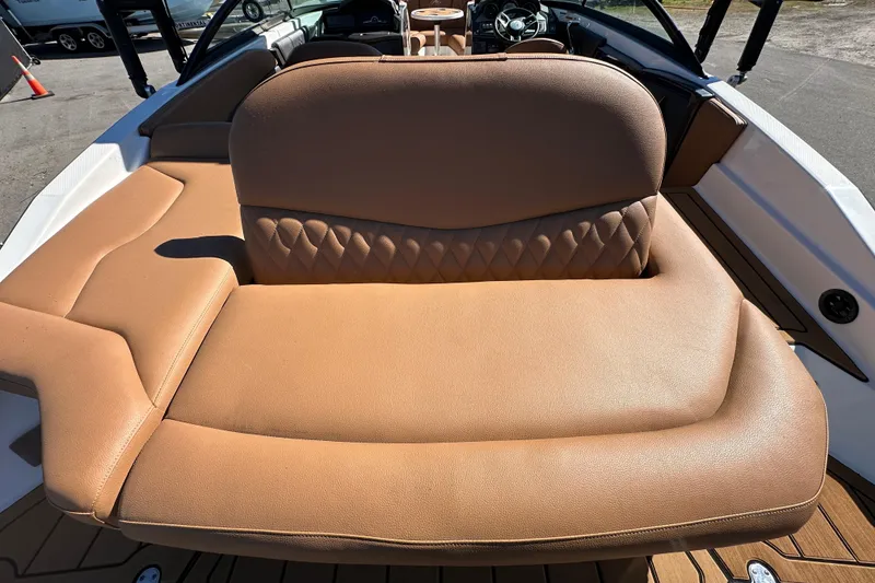 Slide: The Image of Luxurious tan seating on 2016 Monterey 218 Surf boat, showcasing elegant design and comfort. - 33