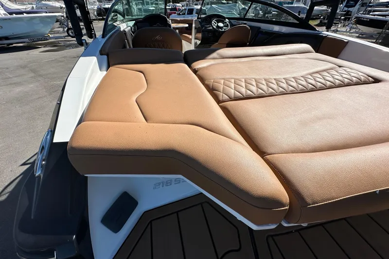Slide: The Image of 2016 Monterey 218 Surf boat with tan leather seating and sleek design. - 34