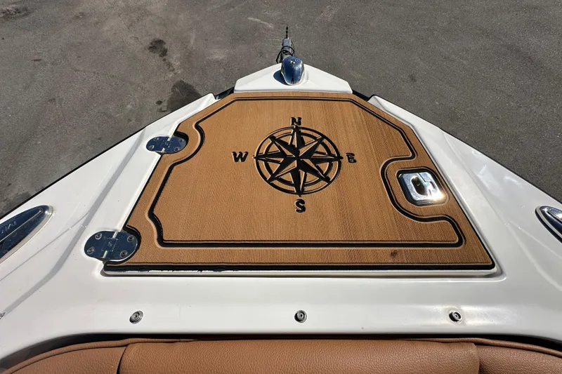 Slide: The Image of 2016 Monterey 218 Surf boat deck with compass rose design. - 38