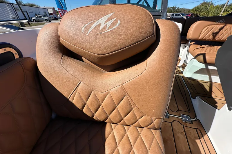 Slide: The Image of Luxurious brown leather seating in 2016 Monterey 218 Surf boat interior. - 46