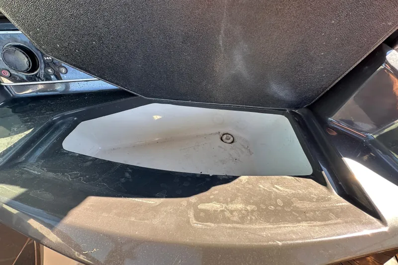 Slide: The Image of 2016 Monterey 218 Surf boat dashboard with sink and control panel. - 54