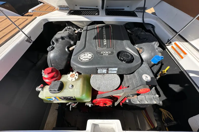 Slide: The Image of Engine compartment of a 2016 Monterey 218 Surf boat with Volvo Penta 280 V6 engine. - 71