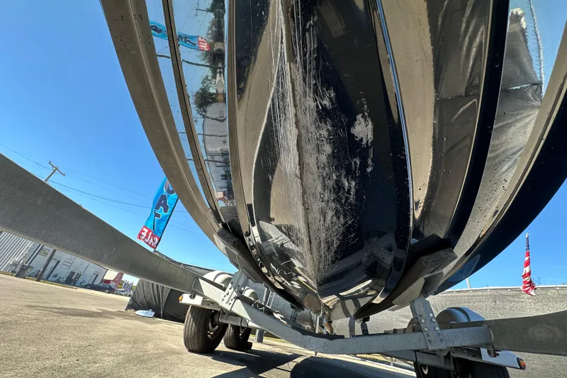 Slide: The Image of Underside view of a 2016 Monterey 218 Surf boat on a trailer, showing hull details. - 75