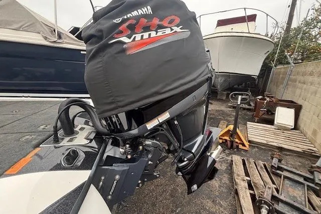 Slide: The Image of 2024 Skeeter FXR21 Limited with Yamaha SHO VMAX engine cover in a boatyard. - 13