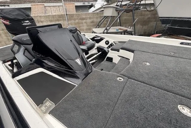 Slide: The Image of 2024 Skeeter FXR21 Limited boat interior with sleek design and spacious seating. - 7