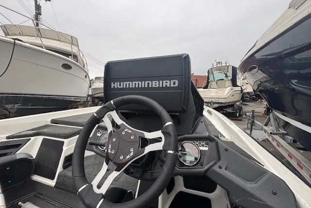 Slide: The Image of 2024 Skeeter FXR21 Limited boat cockpit with Humminbird navigation system. - 9