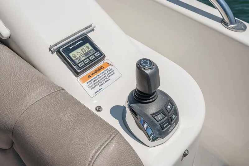 Slide: The Image of Control panel of 2021 Riviera 4800 Sport Yacht with joystick and display. - 31