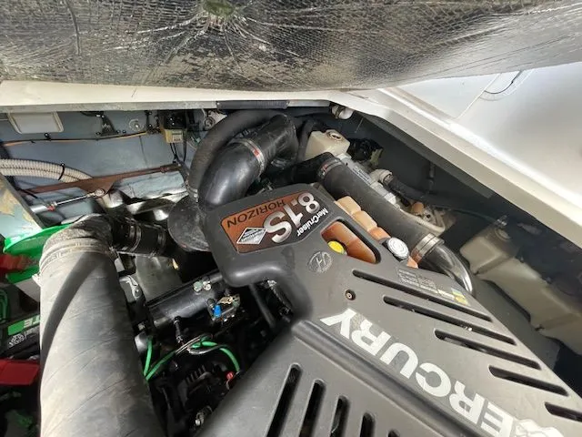 Slide: The Image of Engine compartment of a 2002 Sea Ray 340 Sundancer boat. - 31