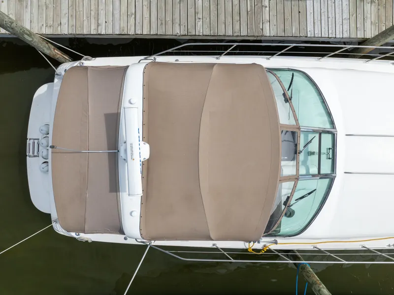 Slide: The Image of Aerial view of a 1997 Sea Ray 400 docked. - 8