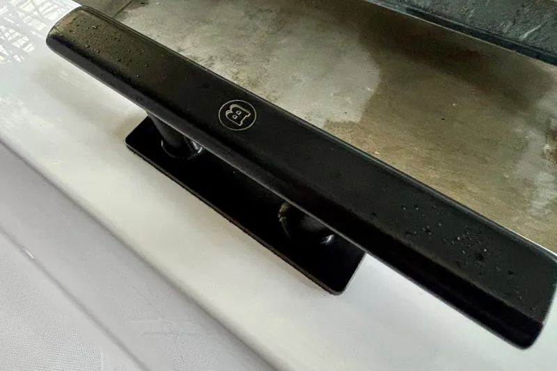 Slide: The Image of 2024 Axopar 37 XC Cross Cabin boat interior view in a showroom. - 28