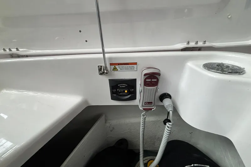 Slide: The Image of 2024 Axopar 37 XC Cross Cabin dashboard with modern navigation displays and controls. - 41