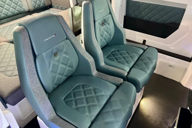 Slide: The Image of Quilted seat detail with Brabus logo in 2024 Axopar 37 XC Cross Cabin. - 51