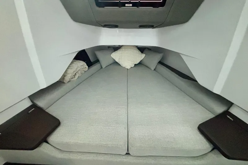 Slide: The Image of 2024 Axopar 37 XC Cross Cabin interior with modern seating and sleek design. - 65